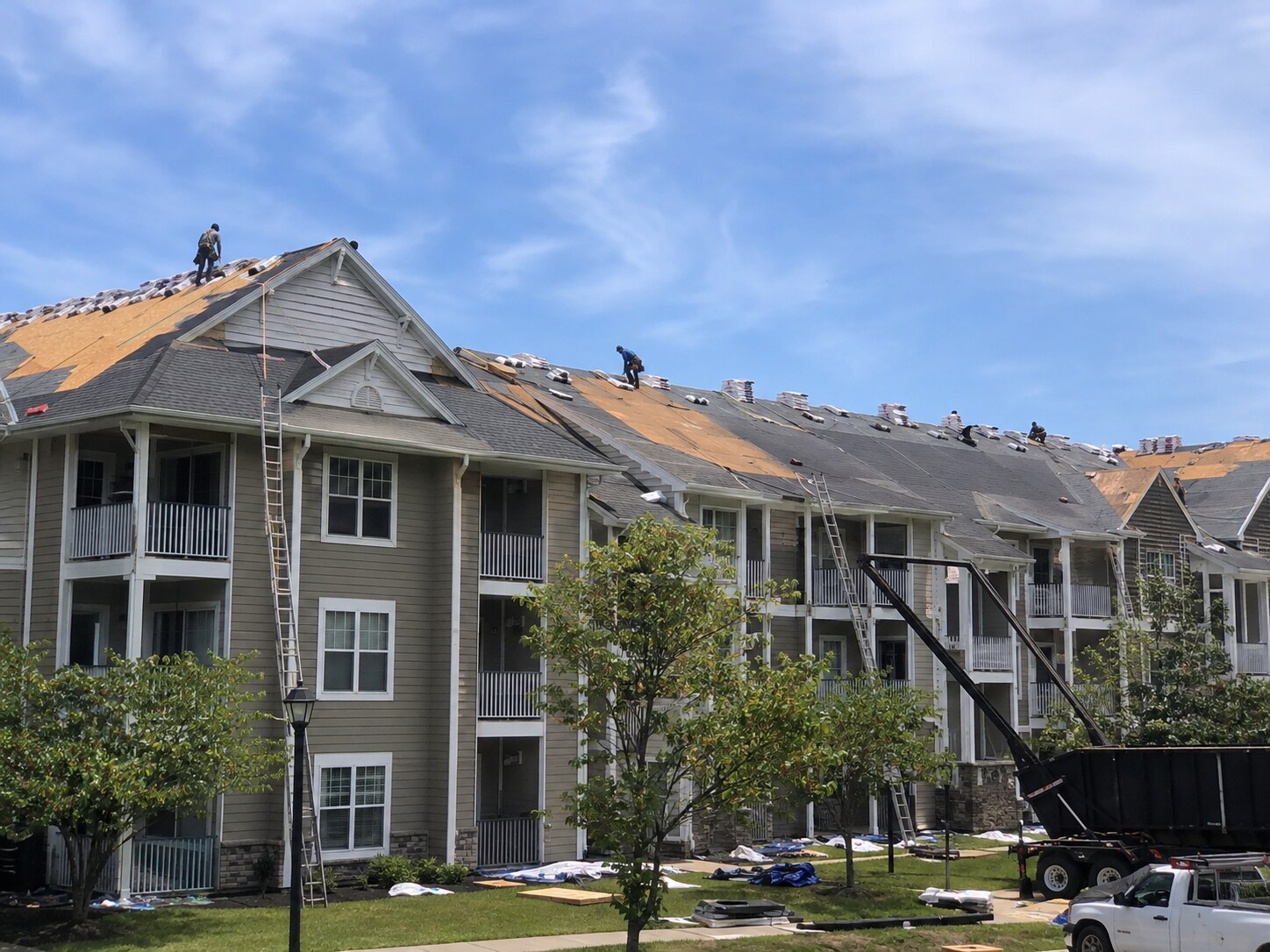 Roof replacement across a multi-unit condominium complex